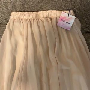 Cream chiffon skirt in perfect condition. Never worn
